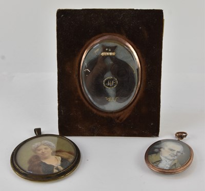Lot 1344 - Three 19th century ivory portrait miniature...