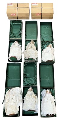 Lot 730 - Eight boxed Perseverando porcelain headed dolls.