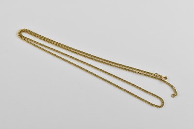 Lot 929 - A yellow metal fine link chain, stamped ‘750’...