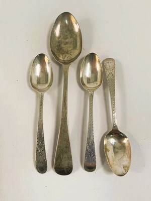 Lot 563 - Three George III hallmarked silver teaspoons,...