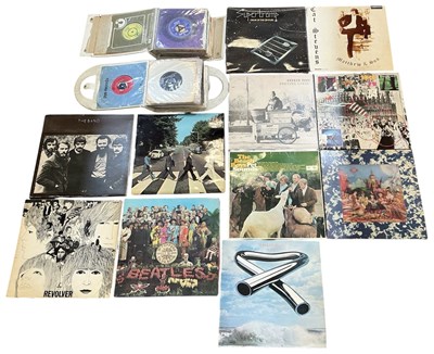Lot 551 - Eleven assorted records and LPs, including The...