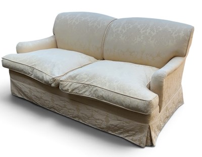 Lot 39 - A modern yellow upholstered two seater sofa,...