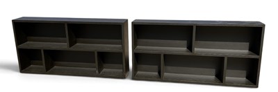Lot 111 - A pair of modern contemporary ebonised...