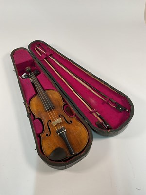 Lot 282 - A full sized German two piece back violin,...