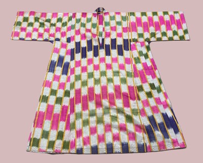 Lot 321 - An Uzbek ikat robe made from cotton and silk,...