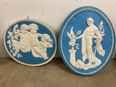 Lot 551 - Two large reconstitued plaques in...