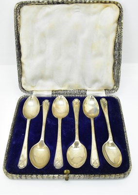 Lot 717 - WALKER & HALL; a set of six George V teaspoons...