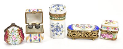 Lot 295 - A collection of porcelain hand painted trinket...