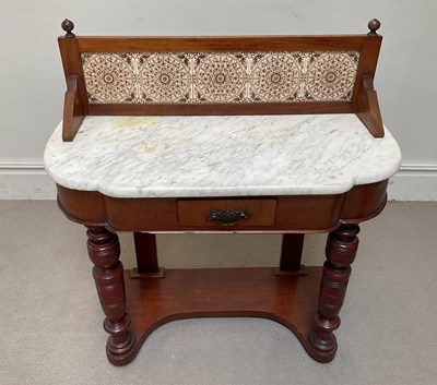 Lot 139 - A Victorian walnut Duchess type washstand,...