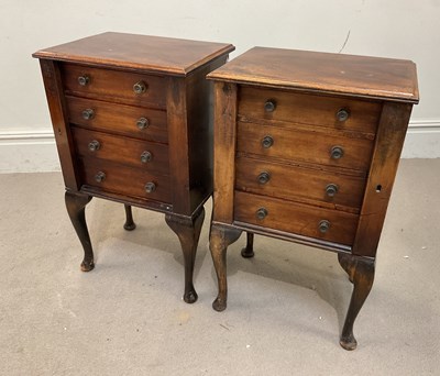 Lot 77 - A pair of 1950s bedside Wellington type chests...