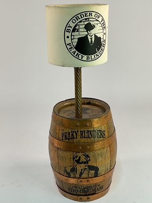 Lot 606 - PEAKY BLINDERS; a wooden barrel with metal...