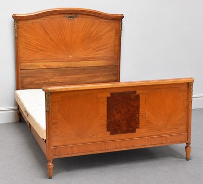 Lot 1213 - An Edwardian satinwood double bedstead with...