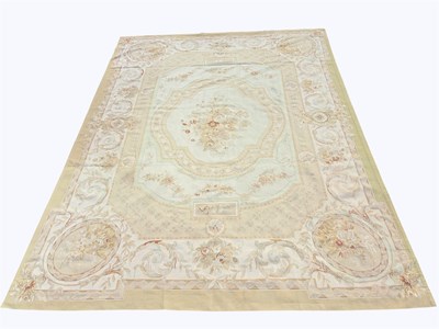 Lot 1385 - A French Aubusson carpet, worked with a...