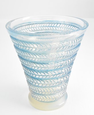 Lot 273 - RENÉ LALIQUE; a conical opalescent glass vase,...