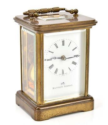 Lot 223 - MATTHEW NORMAN; a brass cased carriage clock,...