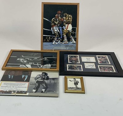 Lot 114 - A quantity of signed framed boxing related...