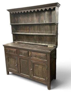 Lot 9 - An 18th/19th century oak dresser, with boarded...