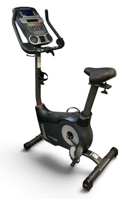 Lot 651 - SCHWINN; an exercise bike, height 146cm,...