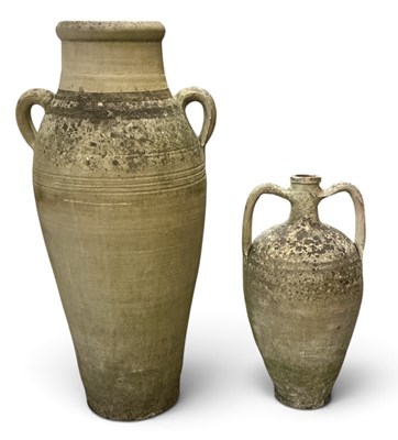 Lot 232 - A modern composite stone twin handled amphora...