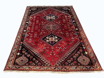 Lot 1388 - A Caucasian hand woven wool carpet, worked...