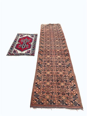 Lot 1396 - A Caucasian hand woven wool runner, 344 x 84cm,...