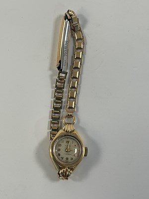 Lot 514 - TITUS; a 14ct yellow gold cased lady's...