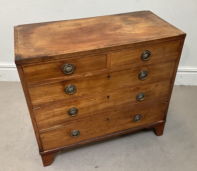 Lot 101 - An early 19th century mahogany chest, with two...
