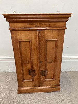 Lot 328 - ROMEO Y JULIETA; a pine hanging cigar cabinet,...