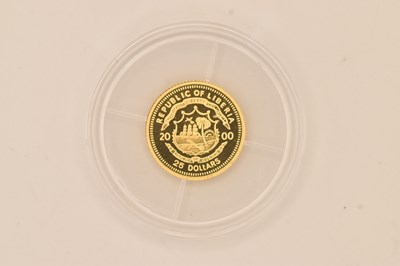 Lot 1736 - An encapsulated gold proof 2000 Republic of...