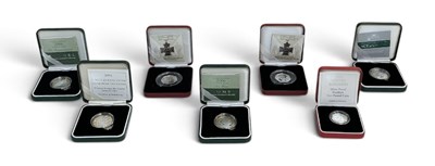 Lot 1684 - ROYAL MINT; seven assorted boxed encapsulated...