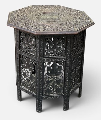 Lot 76 - A 19th century Anglo-Indian profusely carved...