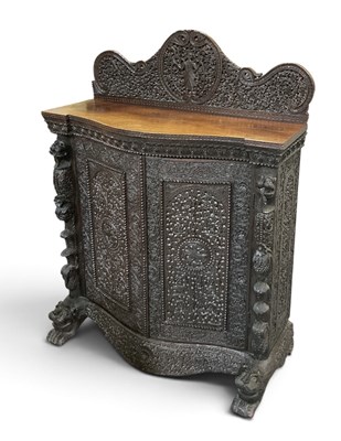 Lot 10 - A 19th century Anglo-Indian profusely carved...