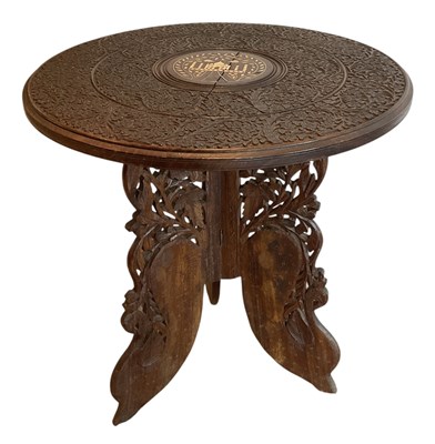 Lot 122 - A 19th century Anglo-Indian profusely carved...
