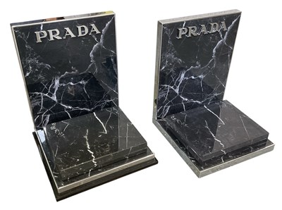 Lot 652 - PRADA; a pair of modern contemporary chrome...