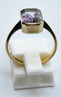 Lot 747 - A 9ct yellow gold dress ring with bezel set...