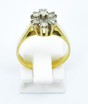 Lot 762 - An 18ct yellow gold ring, with seven tiny...