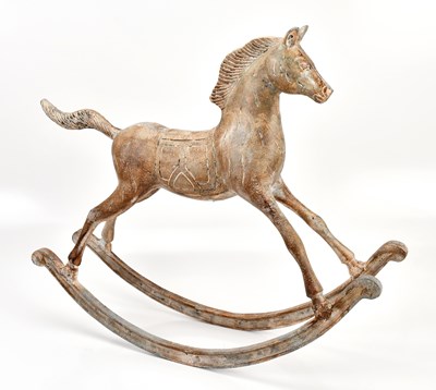 Lot 2138 - A decorative metal model of a rocking horse,...