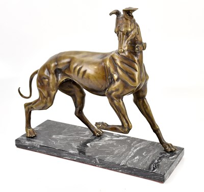 Lot 2141 - A large modern bronze model of a greyhound, on...