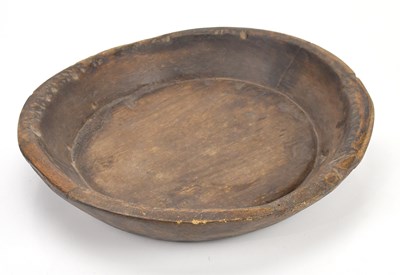 Lot 2067 - A rustic wooden bowl, length 38cm.