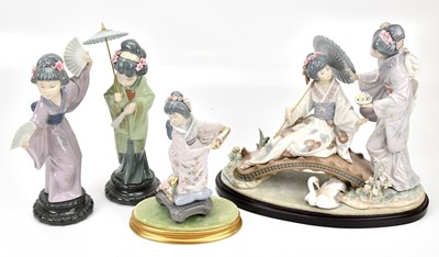 Lot 1275 - LLADRÓ; a group of four figures comprising...