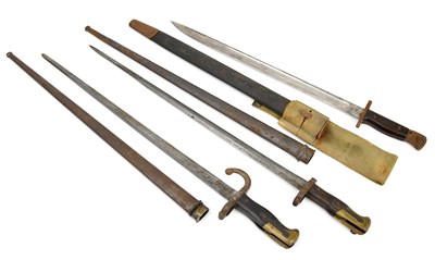 Lot 1073 - Two 19th century French ‘Gras’ epee bayonets,...