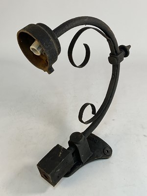 Lot 570 - REVO; an early 20th century wrought iron...