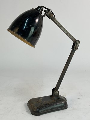 Lot 571 - MEMLITE; an industrial articulated desk lamp.