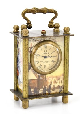 Lot 211 - A miniature carriage clock, the dial stamped...