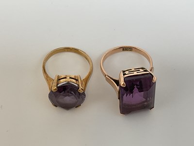 Lot 574 - A 14ct yellow gold amethyst dress ring, size L...