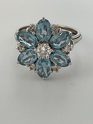 Lot 576 - A white metal diamond and aquamarine...