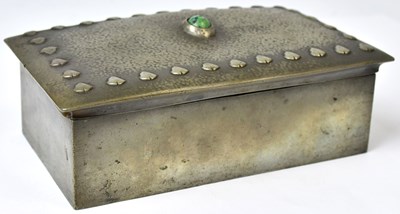 Lot 89 - TUDRIC; a pewter cigarette box with hammered...
