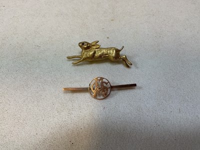 Lot 579 - A 9ct yellow gold brooch pierced with initials,...