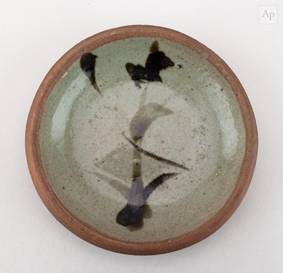 Lot 597 - SHOJI HAMADA (1894-1978); a small stoneware...