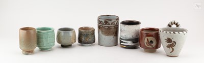 Lot 684 - A group of stoneware and porcelain ceramics by...